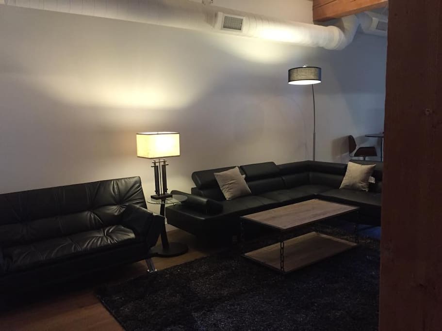 Two couches with plenty of reading lights.