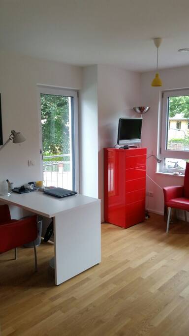 Your room is equiped with a desk, TV, french balcony