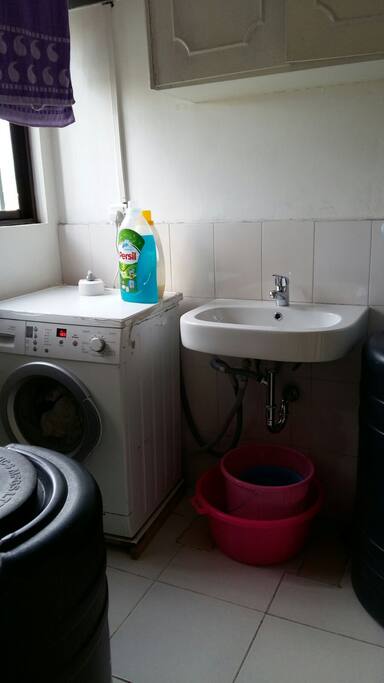 Laundry room complete with washing machine