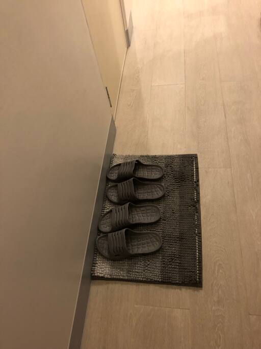 Two pairs of indoor slippers to be used by guests while inside the unit