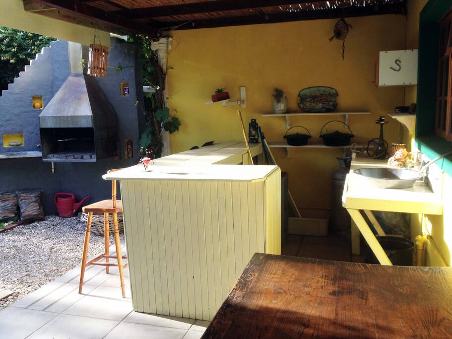 The braai area at back of main house on south side of stoop.
Note an additional room for two is located in the house with access to full facilities.