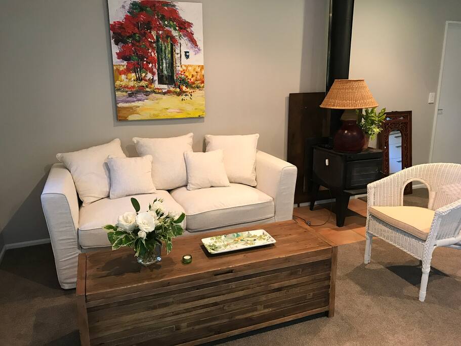 Comfy Couch with heater and plush carpets.