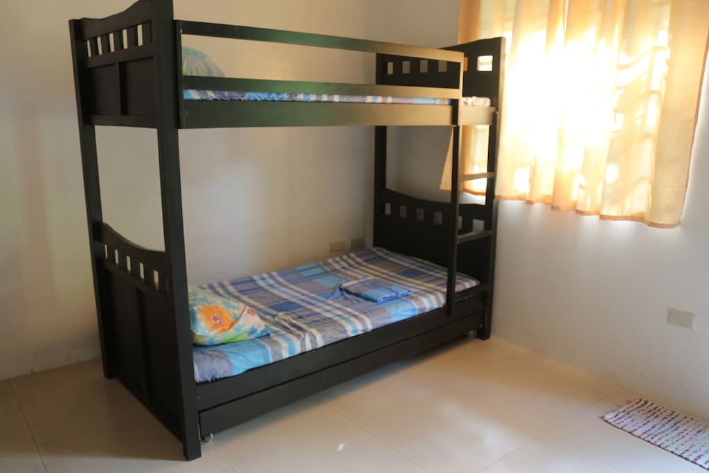 Interior: Bunk bed near the window