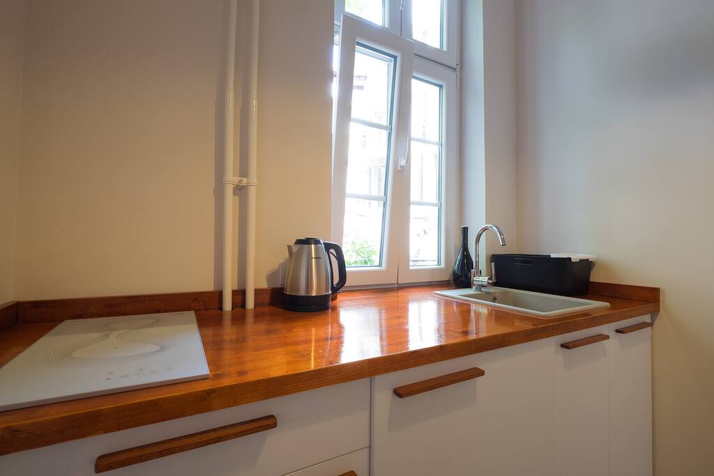 Kitchen work area. Very proud of the designer hot plate. :)