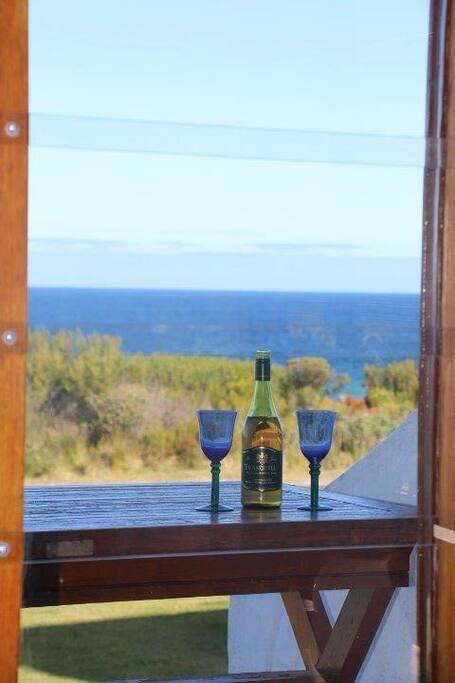 Enjoy wine on the front front porch.