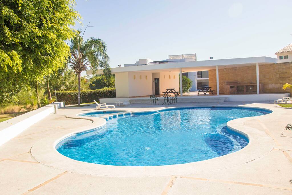 Huge pool area with restrooms