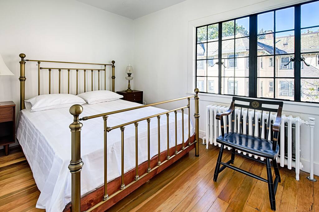 The 1st bedroom is bright and comfortable