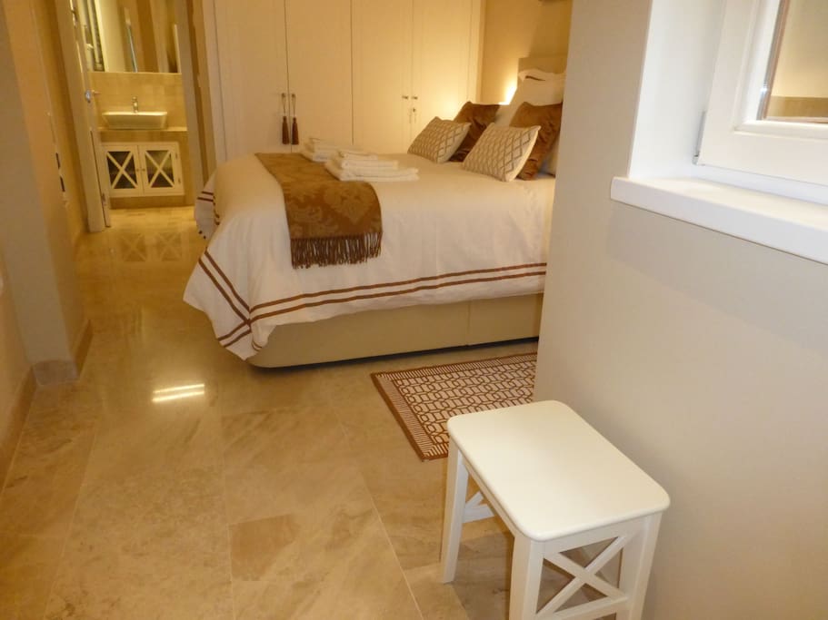bedroom with ensuite and built in wardrobes