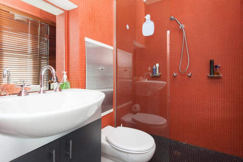 Your en-suite bathroom, with towels, shampoo and hairdryer provided.
