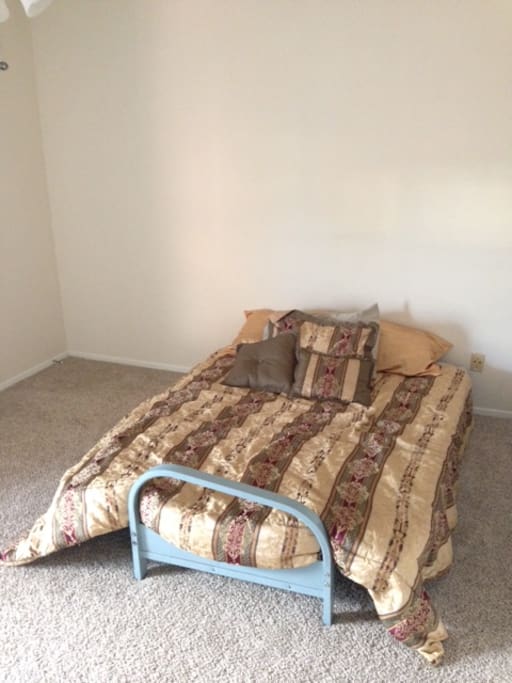 This is where it will all go down. Your magical resting spot features a memory foam mattress futon.