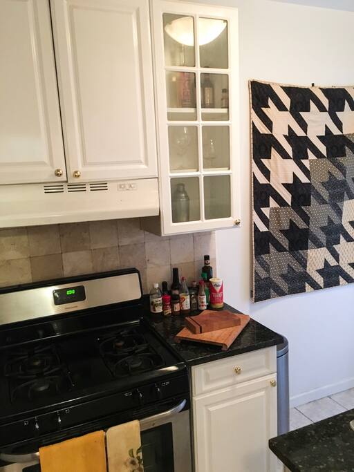 Full Kitchen w/Gas Stove. A lot of counter space behind stove.