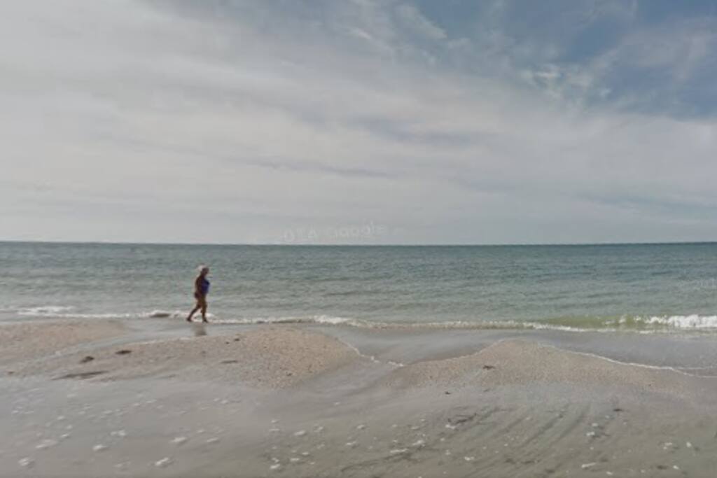 Take a Walk on the beach, a few steps from the condo across the street