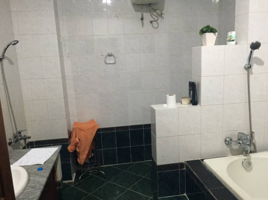 Bathroom, 2 showers toilet and tub, lots of storage space
