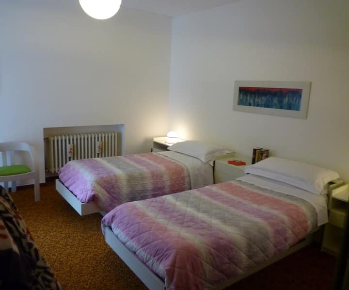 Large double room with single beds. Pillows and mattresses are new. 
