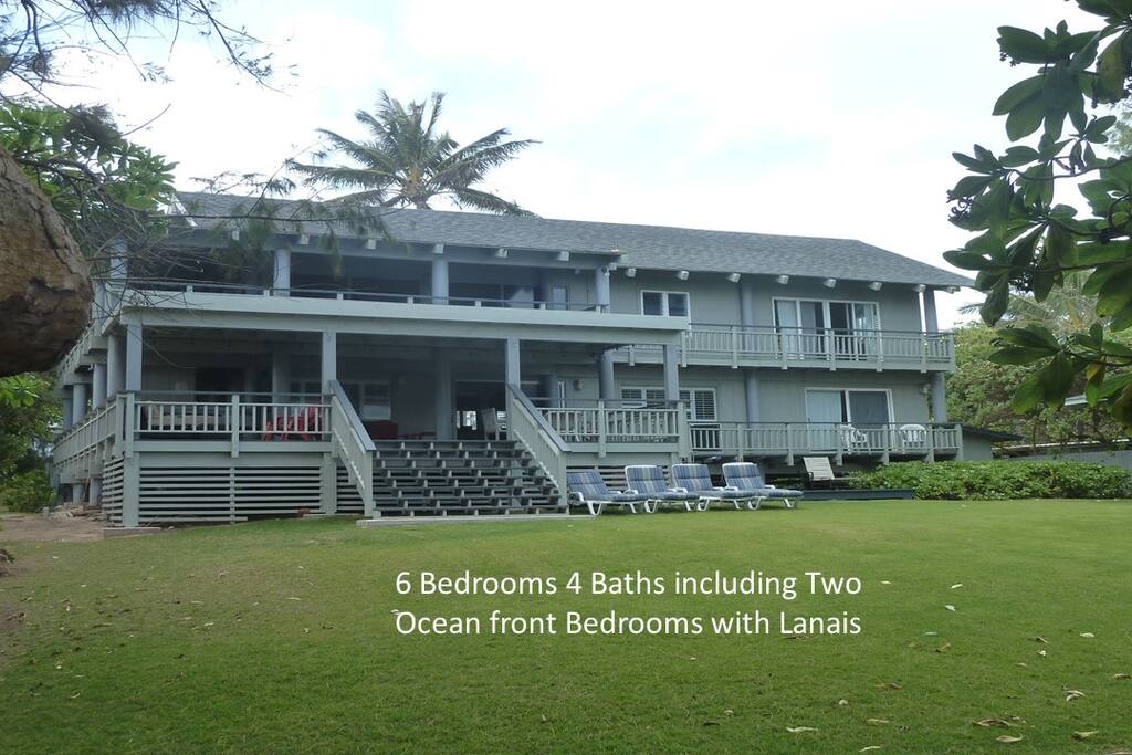 Looking from yard towards beach home. Spacious yard for your enjoyments.
