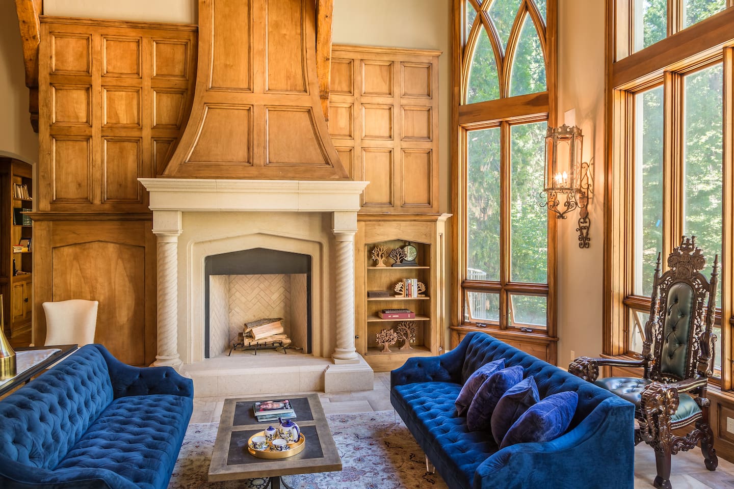 Living Room w Fireplace and floor-to-ceilings windows - Castle In The Forest 