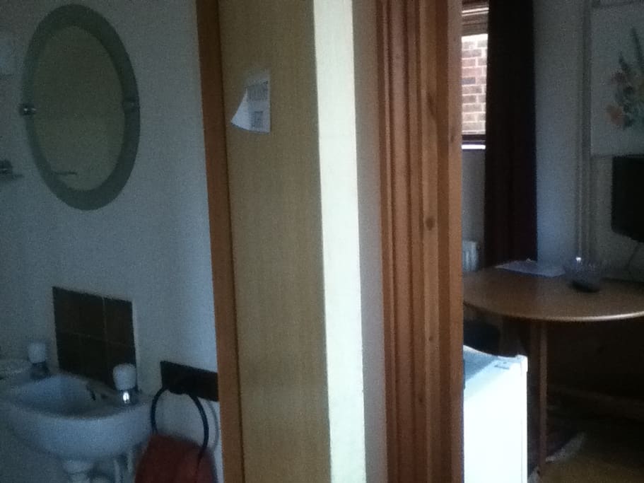 cloakroom adjacent to room
