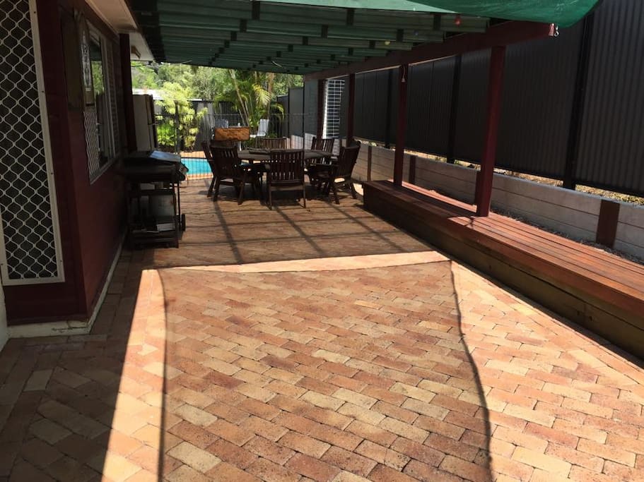 outdoor entertainment area that is available for use - undercover 8 seater table & BBQ