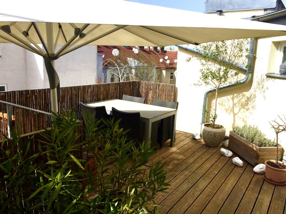 Relax and eat on our sunny rooftop deck