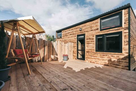 Idyllic tiny house with sauna