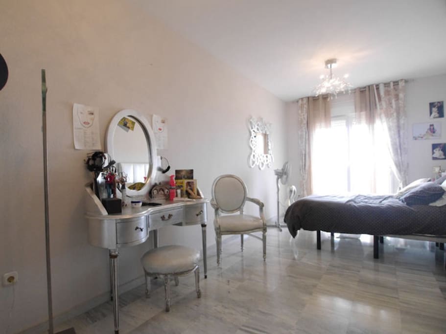 En suite master bedroom with sea views