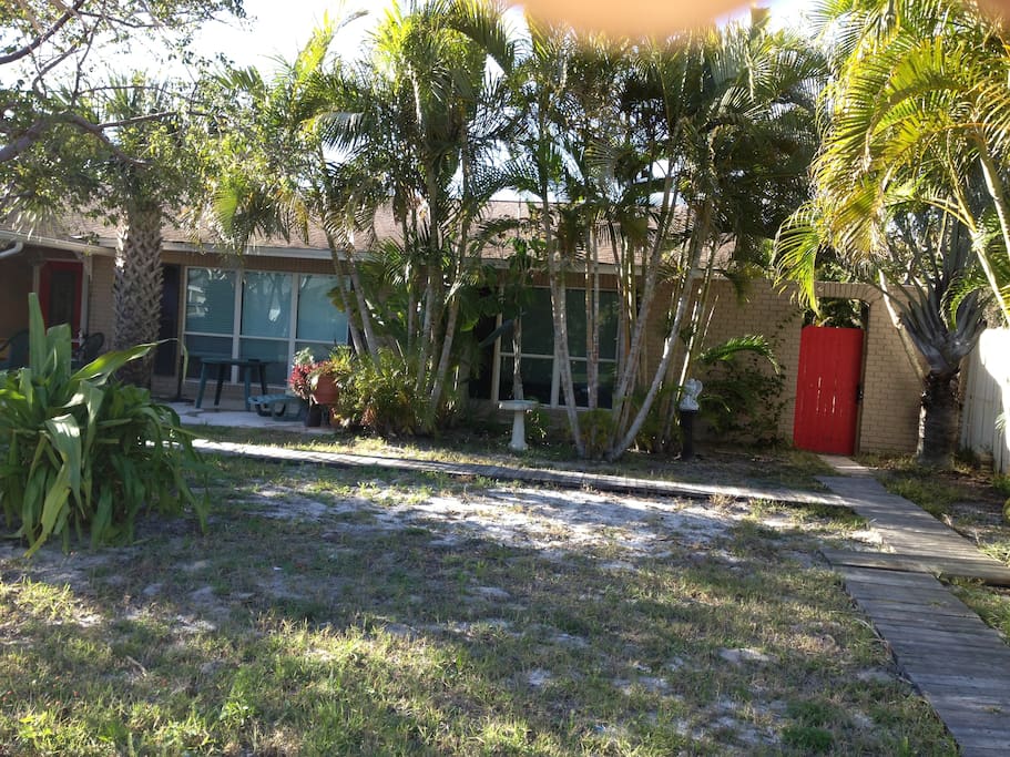 front view of our home - YOU will go through the RED gate to the right