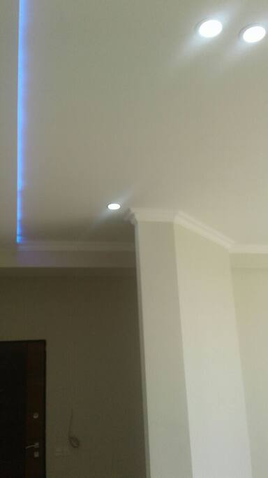 Violet LED lights across the living room