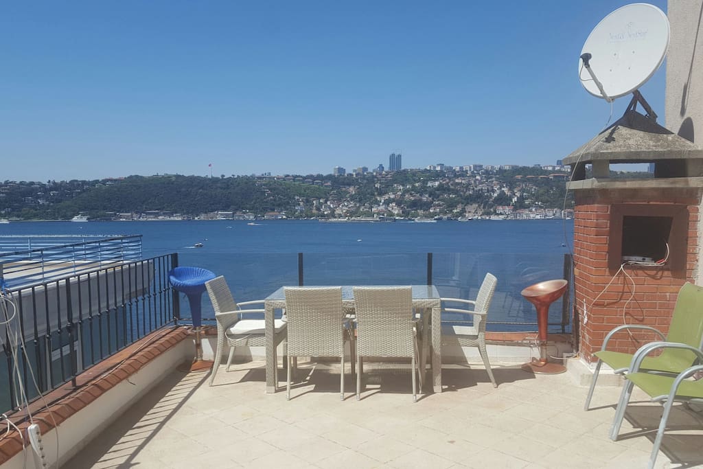 The terrace has it all. The view, the dining table, 8 chairs, gas bbq so you can enjoy your fish and wine with this romantic Istanbul view.