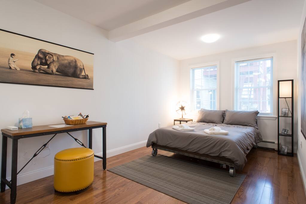 Queen size bed with a luxurious, comfortable mattress.