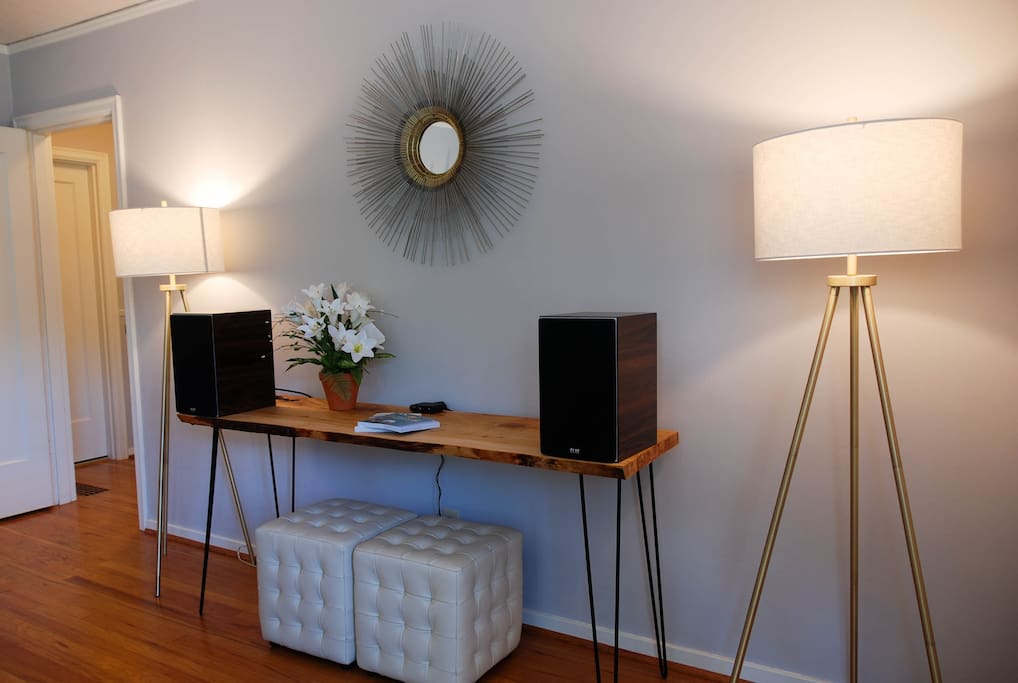 Welcome table with high-end sound system in living room.