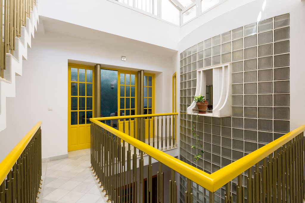 Second floor (yellow). On this level there is 1 bedroom, 1 bathroom and the living room.