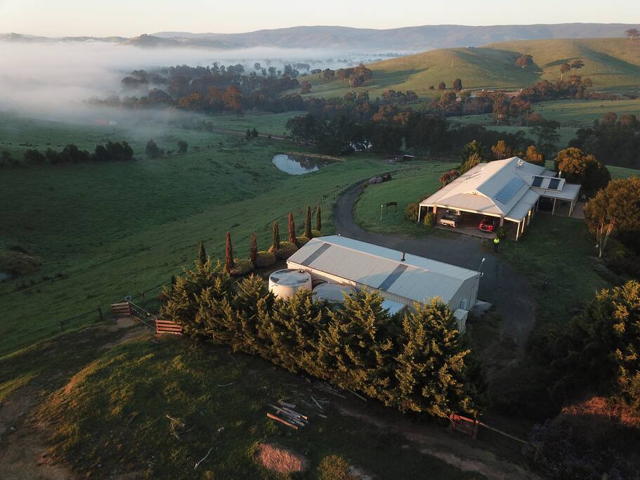 Arial shot of Farmhouse and shed