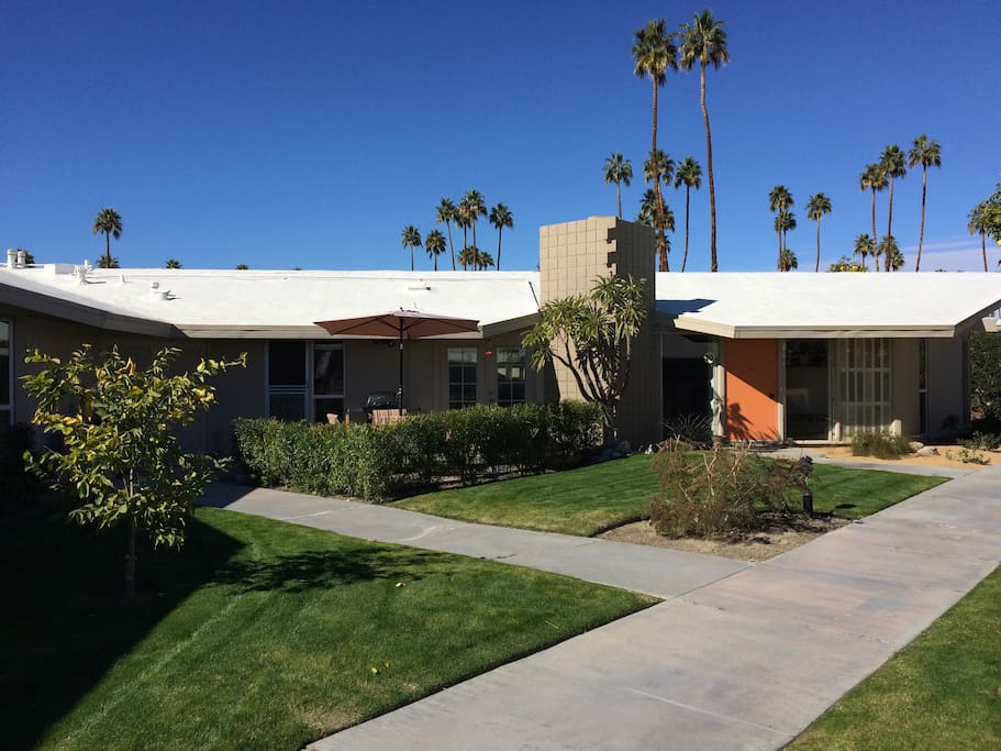 The front of your unit with a patio and utility shed on the left end.