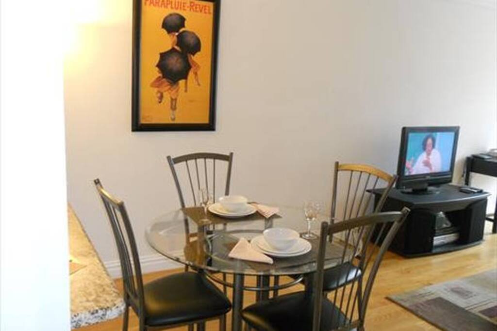 Dining area with seating for four, where you can dine in comfort.
