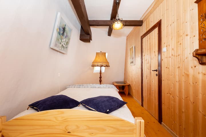 bedroom on the top floor in the Windmill