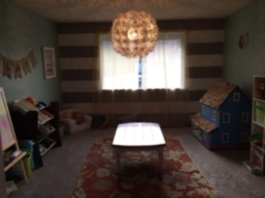 Playroom (table could be moved for air mattress/ sleeping bags)