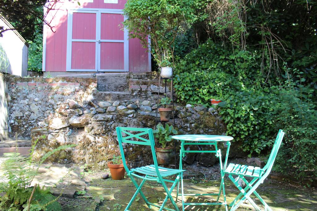 Private wooded backyard with a small fish pond!