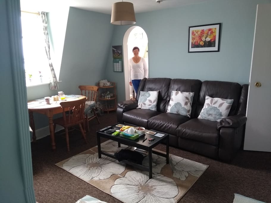 Living room with your friendly host, Wendy to welcome you
