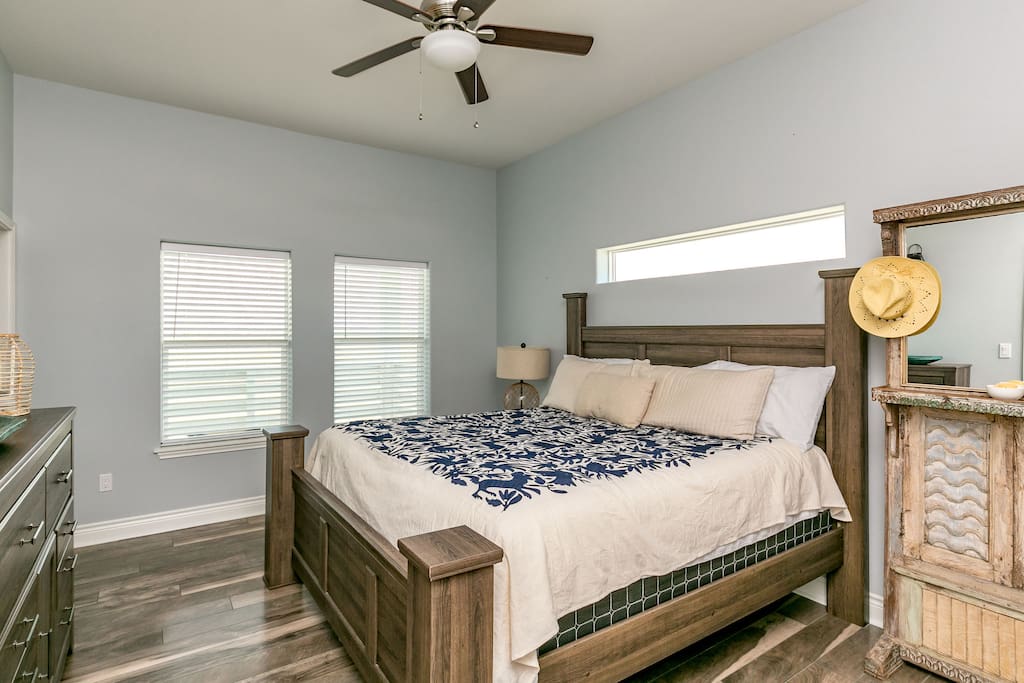 The master bedroom has a king-size bed