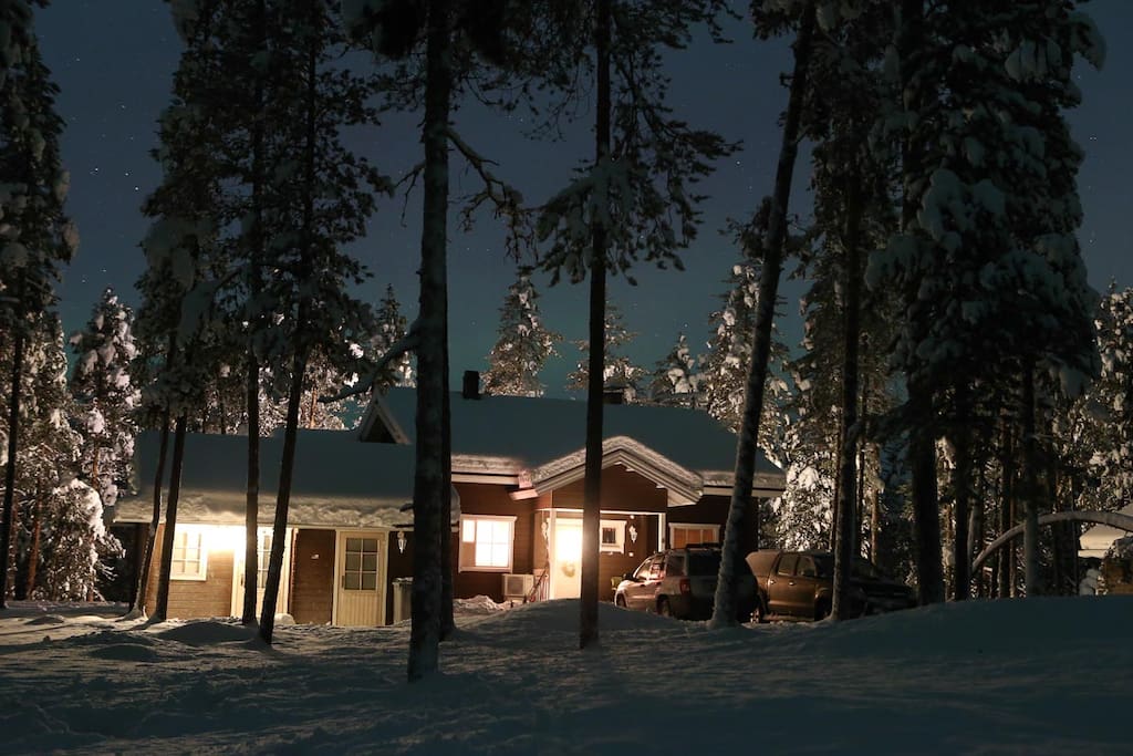Cottage in a winter evening