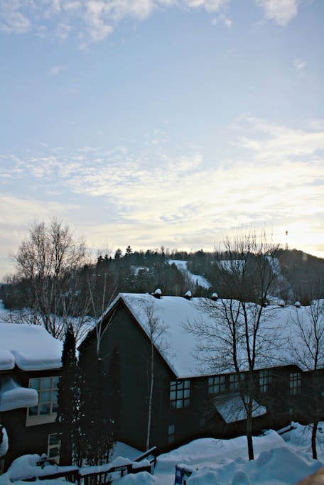View of ski hill out the window.