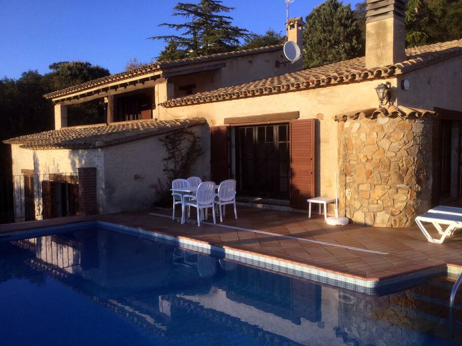 View of the villa by the pool in the late afternoon