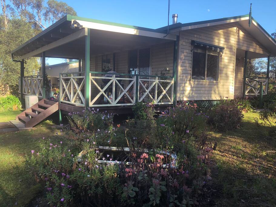 View of the cottage and veranda from the garden 
