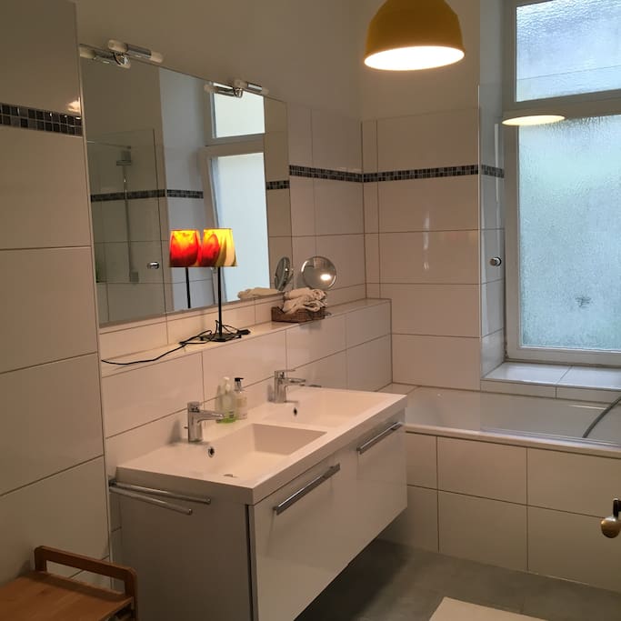 Brand new bathroom with toilet and bath cube and a big window. Towels are provided. Hairdryer as well.