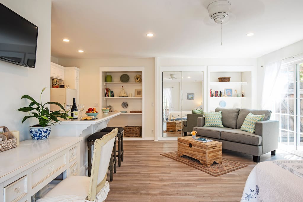 Studio interior with seating area & breakfast bar