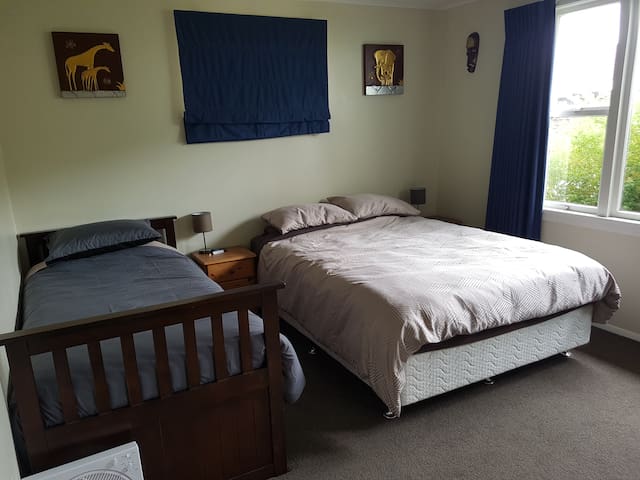 Queen bed room, with King single bed