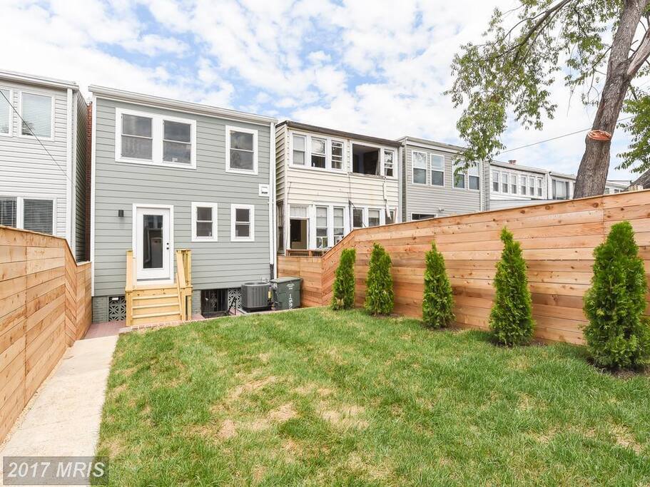 Back yard showing entrance to Garden Level