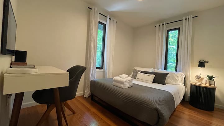 Left Bedroom: queen bed (Sweetnight mattress), closet, desk, Samsung Smart Frame TV + HDMI input for use (gaming/PC) 