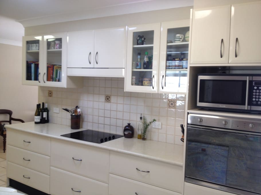 A well appointed galley kitchen with Smeg and Bosch appliances.