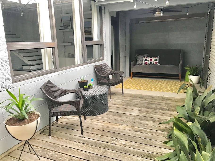 Open air courtyard provides private, covered walkway between 2 car garage and entrance to townhouse.